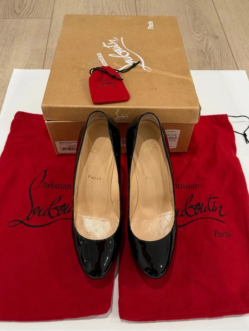 Christian Louboutin Black Patent Leather Round-Toe Pumps